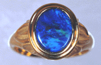 Conni Mainne 18kt gold ring with black opal doublet; finger size 6 3/4. (J3584)