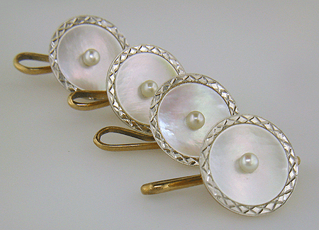 Carrington mother-of-pearl and pearl dress set crafted in platinum and 14kt yellow gold. (J8534)