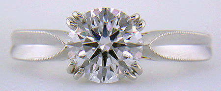 Platinum diamond ring with 18kt gold accents.