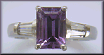 Lavender Sapphire set with tapered baguette diamonds in a hand-crafted platinum ring. (J8527)