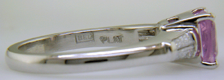 Close-up of Bijoux Extraordinaire hallmark.