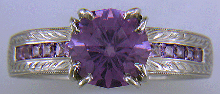 Lavender spinel set with sparkling lilac sapphires in a beautifully hand-engraved platinum ring.