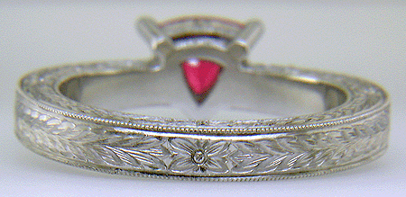 Hand engraved platinum ring with a trillium red spinel. (J6408)