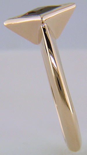 A Rhodolite Garnet set in a handcrafted rose gold ring. (J8701)