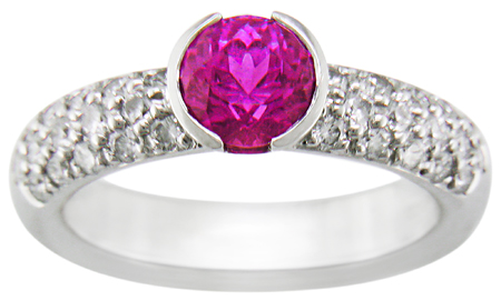 Pink sapphire and pavé-set diamonds platinum ring.