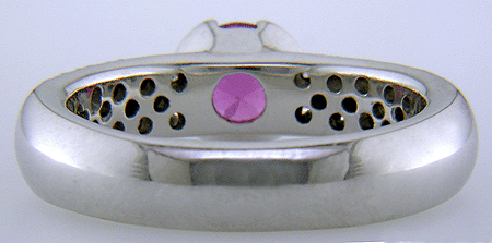 Inside view of pink sapphire and pave-set diamonds platinum ring.