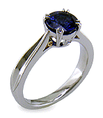 Sapphire Rings - Sapphire ring crafted in platinum with two hidden diamonds and gold accents. (J8751)