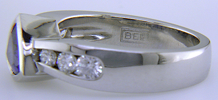 Bijoux Extraordinaire hallmark (BEL) and platinum purity mark.