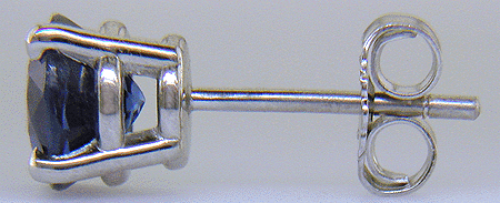 Side view of platinum sapphire stud earrings.