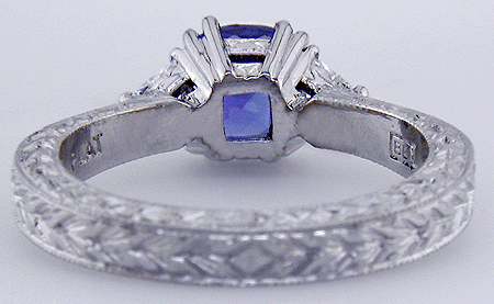 Inside view of engraved platinum ring with tanzanite and diamonds.