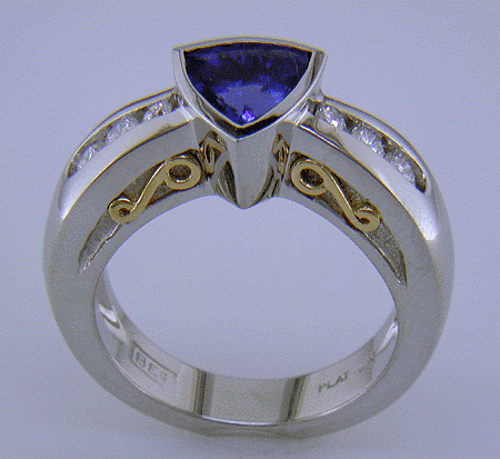 Side view custom tanzanite and diamond platinum ring.