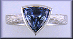Trillium Sapphire set in engraved platinum ring.