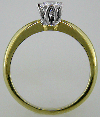 Side view of 18kt gold tulip-set engagement ring with solitaire diamond. (J2870)