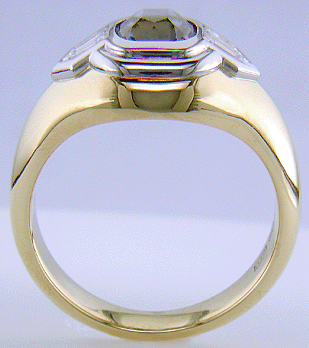 Custom Sapphire and Diamond ring crafted in 18kt gold and platinum.