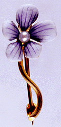 A diminutive Art Nouveau flower brooch. (J2056)