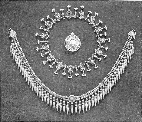 Necklaces and brooch from the Giuliano bequest.