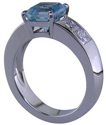 Side view of Aquamarine and Diamond handcrafted platinum ring.