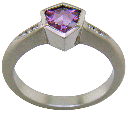 Side view of purple sapphire and diamond custom platinum ring.