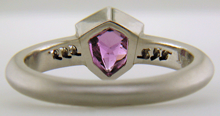 Inside view of purple sapphire and diamond custom platinum ring.