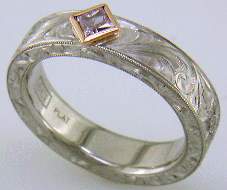 Hand engraved platinum ring with pink diamonds. (MEZA1193)