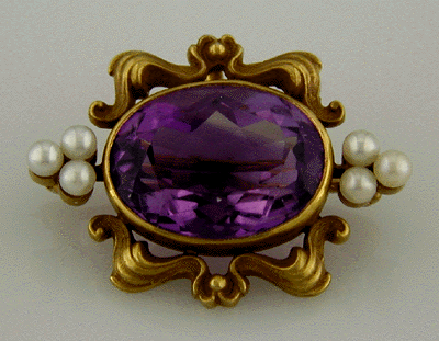 Art Nouveau amethyst and pearl pin in 14kt gold.