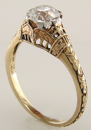 Antique filigree ring with an Old European cut diamond.