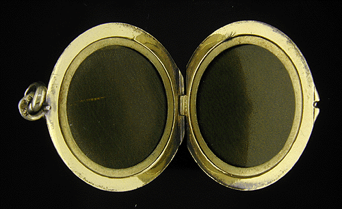 Inside view of antique enamel locket.