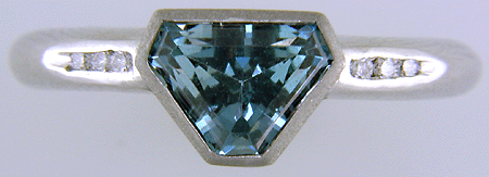 Calf-head Aquamarine with round diamonds in a custom platinum ring. (J7417)