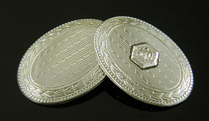 Art Deco diamond and engraved platinum cufflinks. (J9259)