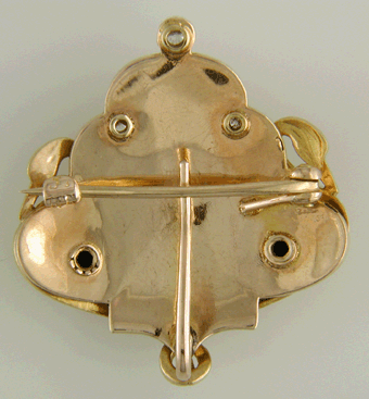 Reat view of Krementz Art Nouveau swan brooch.