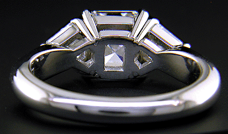 Inside view of handcrafted platinum ring with Asscher cut diamond.