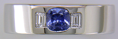 Custom platinum band with burnish set sapphires and diamonds.