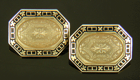 Richly engraved 14kt gold cufflinks with black enamel borders. (J6791)