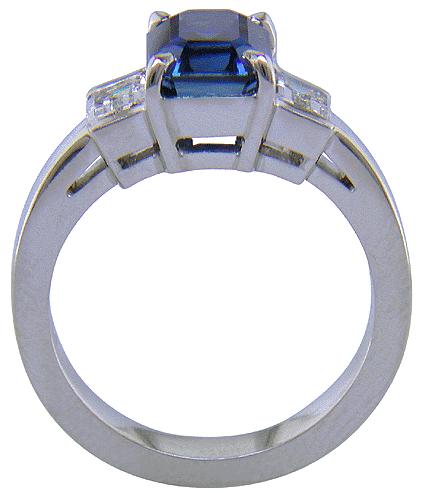 Side view of sapphire and diamond ring handcrafted in platinum.