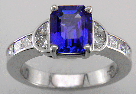 2.90ct emerald-cut sapphire and diamond ring in platinum.