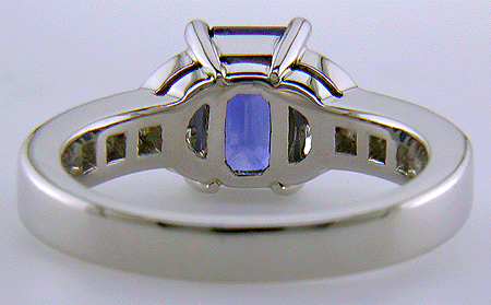 Inside view of emerald-cut sapphire and diamond ring in platinum. (J6095)