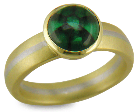 A gold and platinum ring set with a Trapiche Emerald.  (J7258)