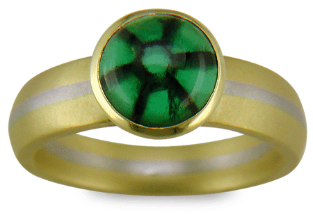 A gold and platinum ring set with a Trapiche Emerald.  (J7258)