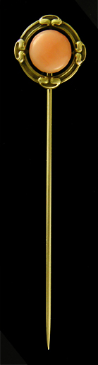 Brassler stickpin with glowing angle skin coral. (J9130)