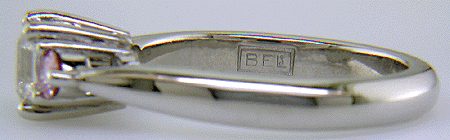 Asscher-cut diamond ring with Bijoux Extraordinaire (BEL) hallmark.