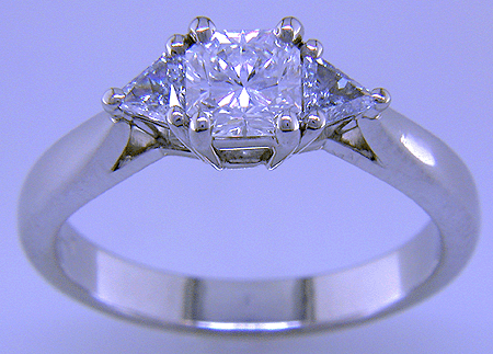 Lucere diamond and Fancy Blue diamonds in a custom platinum ring.