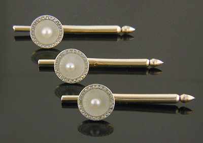 Carrington mother-of-pearl and pearl dress set crafted in platinum and 14kt yellow gold. (J8765)