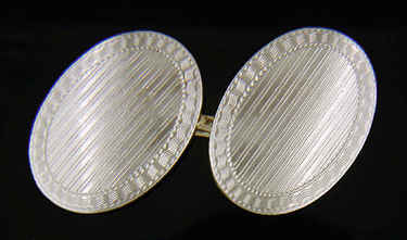 Carrington platinum and gold cufflinks. (J7484)