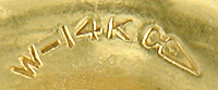 Close up of Carter, Gough maker's mark on back of cufflinks and studs. (J7176)