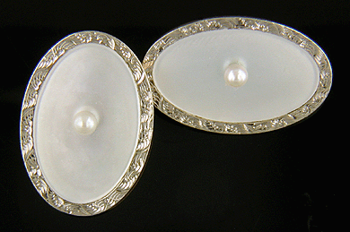 Carter, Gough 14kt gold pearl and mother-of-pearl cufflinks. (J8650)