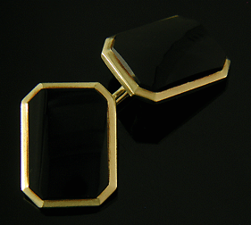 Carter, Howe Onyx cufflinks crafted in 14kt yellow gold. (J8789)