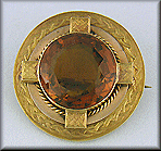 Victorian Celtic Revival gold brooch with Citrine. (J7408)