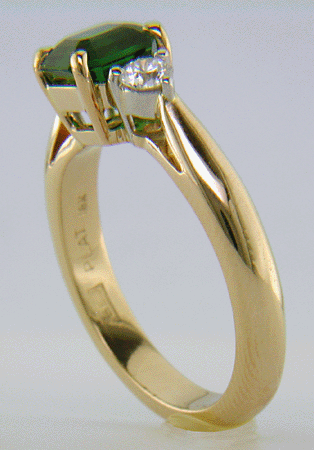 Emerald-cut Chrome Tourmaline set with two round diamonds in a handcrafted 18kt gold and platinum ring.