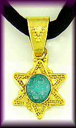 Drusy chrysocolla set in a 22kt gold pendant.