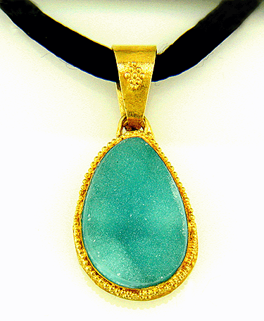 Drusy chrysocolla set in 22kt gold pendant.